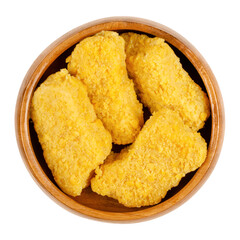 Vegan nuggets, ready to fry, in a wooden bowl. Vegan nuggets, based on soy and wheat protein, in crispy breading, pre-fried and cooked. Close-up, from above, isolated on white background, food photo.