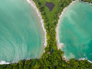 Beautiful aerial view of Manuel Antonio National Park and its magnificent beach in Quepos Costa...