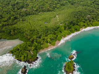 Fototapeta na wymiar Beautiful aerial view of Manuel Antonio National Park and its magnificent beach in Quepos Costa Rica 