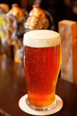 Pints of ale on the bar top of an Irish pub.  Whistler BC, Canada.