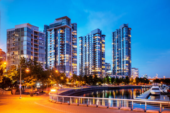 Apartment condominium towers in Vancouver's Yaletown neighbourhood at dusk.