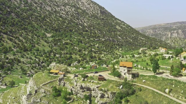Aerial view rural mountain landscape of Lebanon. Rocky mountain houses with vineyards and orchards.