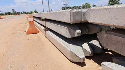 Closeup reinforced concrete piles. High-strength prestressed concrete piles made of fast-hardening...
