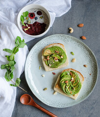 Homemade delicious and healthy meals / Avocado Toast with Mixed Berry Smoothie & Chia Seed Pudding / Light eat fortified with high nutritional value for clean living lifestyle