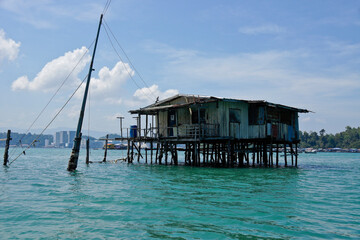 Dwelling (with electricity) built on stilts in South China Sea near Kota Kinabalu, Sabah (Borneo), Malaysia