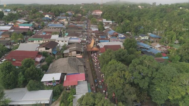 Tak Bat Devo Holiday Festivals in Kanchanaburi Thailand