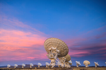 Satellite antenna array at dusk