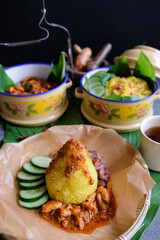 Homemade traditional Peranakan Malaysian cuisine / Nasi Kunyit aka Turmeric Glutinous Rice /...