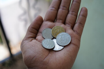 Indian rupees coins in hand