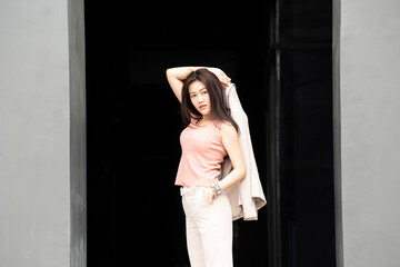 Fototapeta premium Woman freelance Lifestyleat camera, posing for photo.