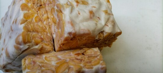 tempe or tempeh, is a traditional Indonesian food. made from fermented soybeans.