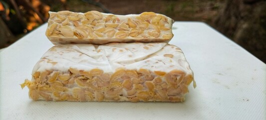 tempe or tempeh, is a traditional Indonesian food. made from fermented soybeans.