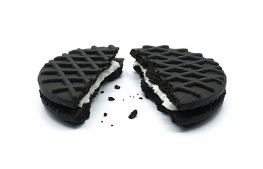 Stuffed cookies and cream flavor, Broken piece with crumbs, Tasty sweet snack, Isolated on white background