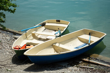 Obraz premium Two small boats on the lake.