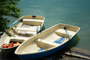 Fototapeta na wymiar Two small boats on the lake.