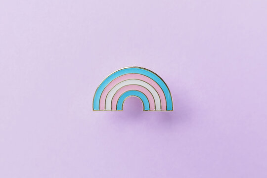 Badge as symbol of transgender on color background