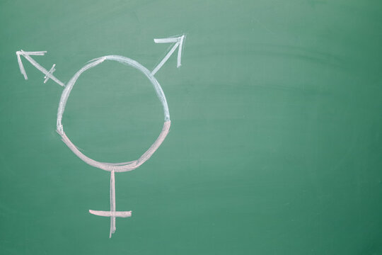 Symbol of transgender drawn on chalkboard
