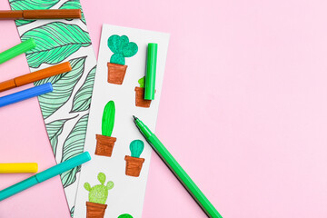 Cute bookmarks with markers on color background