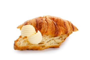 Fresh croissant with butter curls on white background