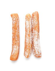 Tasty churros on white background