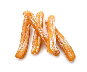Tasty churros on white background