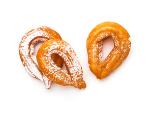 Tasty churros on white background