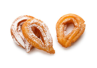 Tasty churros on white background