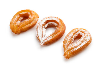 Tasty churros on white background