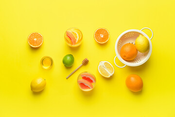 Composition with tasty cold lemonade and ingredients on color background