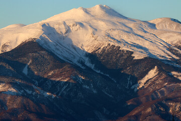 夕方の南から見た雪山の乗鞍岳