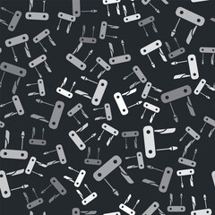 Fototapeta na wymiar Grey Swiss army knife icon isolated seamless pattern on black background. Multi-tool, multipurpose penknife. Multifunctional tool. Vector