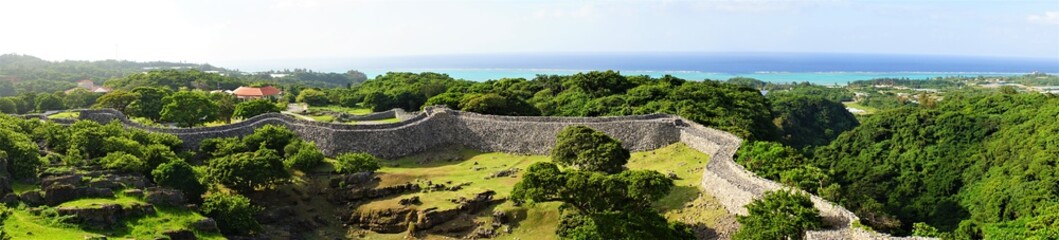 Aerial view of Nakijinjo castle ruins and the stone wall in Okinawa. Japan, panoramic view - 日本 沖縄 今帰仁城跡 城壁 パノラマ - obrazy, fototapety, plakaty