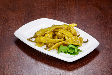 Pickled yellow pepper in the bowl
