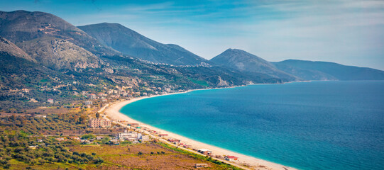 Aerial morning view of Borshit beach. Qazim Pali cityscape. Colorful spring seascape of Adriatic sea. Stunning outdoor scene of Albania, Europe. Traveling concept background.