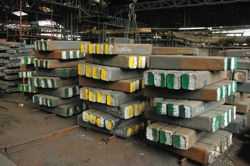 Ingots, steel bars and metal blanks with marking kept in warehouse