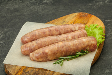 Raw pork meat sausages for grill