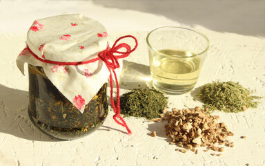 Ingredients for herbal hair mask. Dried herbs nettles, horsetails, tortillas and olive oil. Homemade Hair Strengthening and Growth Mask