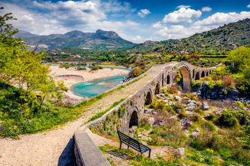 Amazing spring view of Old Mes Bridge. Stunning morning landscape of Shkoder. Picturesque outdoor...