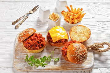 Sloppy Joe sandwiches with french Fries, top view