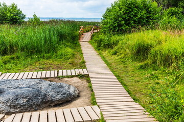 A legendary twelve-ton boulder Blue stone  in the Pleshcheyevo National Park near ...