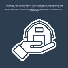 Blue line Farm house in hand icon isolated on blue background. Vector