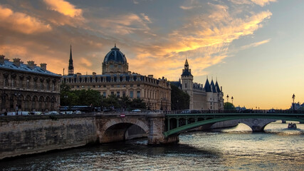 Fototapeta na wymiar Conciergerie and Seine river in Paris at sunset