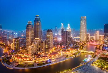 Naklejka na ściany i meble Aerial photography of skyline night scene of Tianjin urban architectural landscape