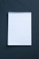 Blank notebook isolated on dark background mockup