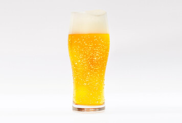 Image of a glass of beer with dripping foam and water drops on a white background.