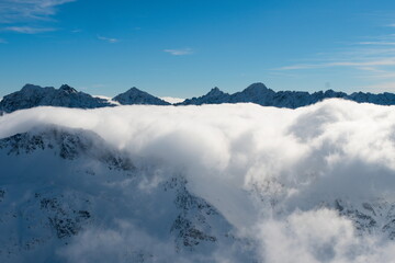 A sea of clouds in a mountain valley. Tatra Mountains Poland. The Valley of the Five Polish Ponds.