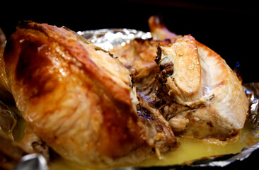 Chicken baked in foil. Grilled chicken .
