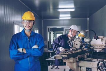 Finishing metal working on high precision CNC grinding machine in workshop.