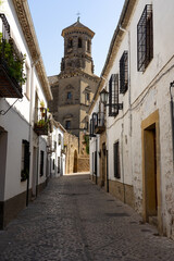 Typical streets in the old town of Baeza with the old University tower, World Heritage Site by UNESCO, JAen, Spain.