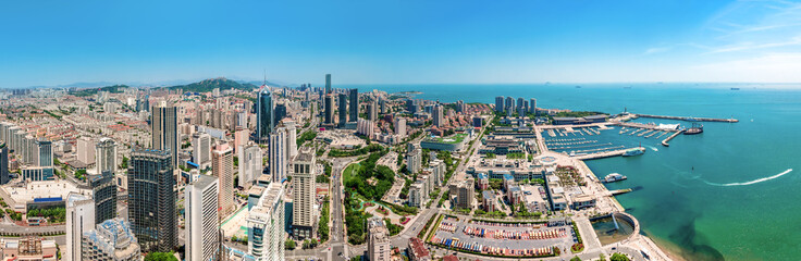 Naklejka na ściany i meble Aerial photography of architectural landscape skyline along Qingdao urban coastline